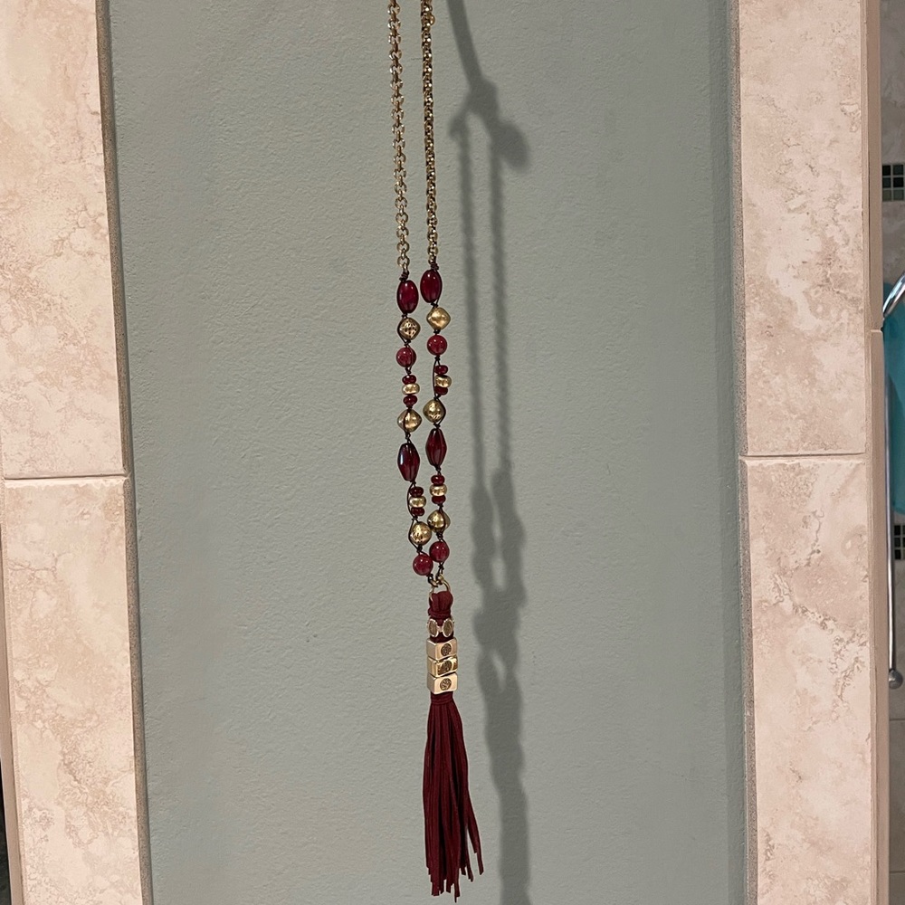 Burgundy and gold necklace with suede tassel
